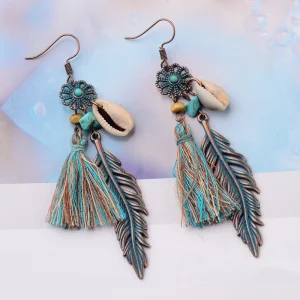 Boucles d'Oreilles Coquillage Pompon